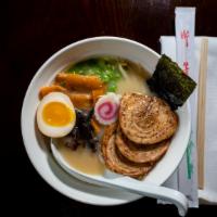 Tonkotsu  Ramen · Ramen noodles served with half egg, Japanese bamboo shoots, beansprouts, green onion, black ...