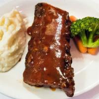 Half Slab Bbq Baby Back Ribs · Served with choice of soup of the day, house salad or upgraded side.
