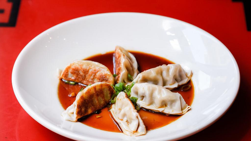 Chicken Pot Stickers (6) · Served with ginger-soy dipping sauce.
