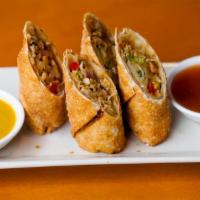 Home-Made Chicken & Peanut Egg Rolls (2) · Hand rolled daily; sweet & sour, mustard sauces.