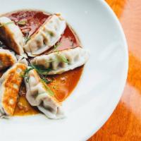 Vegetable Pot Stickers (6) · Vegetarian. Served with ginger-soy dipping sauce.