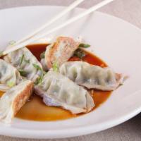 Chicken Dumplings (6) · Served with ginger-soy dipping sauce.