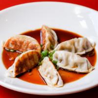 Combination Pot Stickers (6) · 3 vegetable, 3 chicken. Served with ginger-soy dipping sauce.