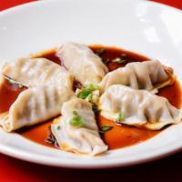 Combination Dumplings (6) · 3 vegetable, 3 chicken. Served with ginger-soy dipping sauce.