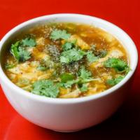 Chinese Hot & Sour Soup · World-renowned classic; pork, chicken, mushrooms.