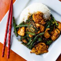 Kung Pao Chicken · Spicy. Wok-tossed chicken, wrinkled green beans, spinach, blackened chilies, chopped peanuts