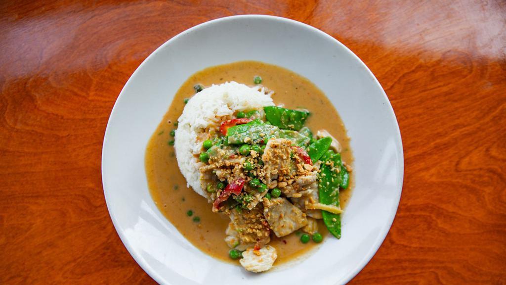 Panang Curry Chicken · Spicy. Sliced chicken in peanut-coconut curry sauce, peas, fresno peppers, snow peas.