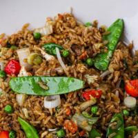 Vegetable Fried Rice · Napa cabbage, snow peas, mushrooms, red peppers, scallions, sprouts, eggs.