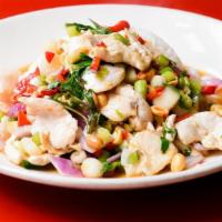 Thai Hot Pepper Chicken · Spicy. Fresno peppers, Thai basil, peanuts, red onions, cilantro, tangy lemon sauce