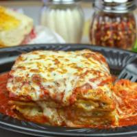Lasagna · With marinara or meat sauce and garlic bread.