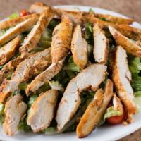 Grilled Chicken Salad · Mediterranean Salad with Chicken and Dressing on the side.