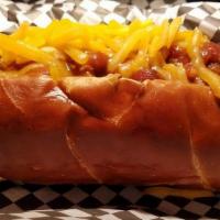 The Texan · Pretzel bun, homemade chili, and cheddar cheese. Served with chips.