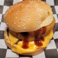 Cowboy Burger · Burger topped with cheese, onion rings and the Coop's own BBQ sauce.