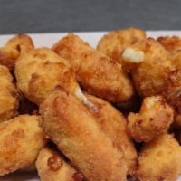 Cheese Curds · White Cheddar cheese curds that will leave you wanting more!