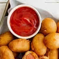 Mini Corn Dogs · Tasty mini corn dogs.  10 per order.  If you would like to add some honey mustard dipping sa...