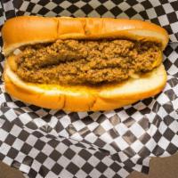 Coney Island · Coney island - a favorite since 1963! Hot dog on a toasted bun topped with diced onions, mus...