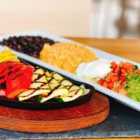 Grilled Veggie Fajitas · Yellow squash, zucchini and red peppers.