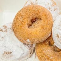 Mini Donuts Half Dozen · Enjoy these poppable donut treats! Available in Cinnamon Sugar, Powdered Sugar, or Plain.