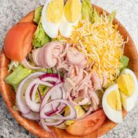 Chef Salad - Half · Favorites. Lettuce, ham, turkey, Swiss and American cheeses, hard boiled egg, tomato and red...