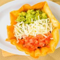 Taco Salad · Large fried flour tortilla bowl with your choice of meat, cheese, tomatoes, lettuce, sour cr...