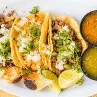 Taco · Corn tortilla with your choice of meat, cilantro & onions. Add cheese or sour cream for an a...