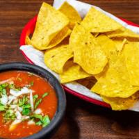 Chips & Salsa · Freshly made corn chips and fresh salsa.