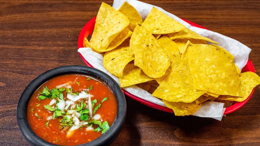 Chips & Salsa · Freshly made corn chips and fresh salsa.