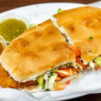 Tortas · Mexican sub with your choice of meat, mayo, tomatoes, lettuce, avocado, & jalapeños.