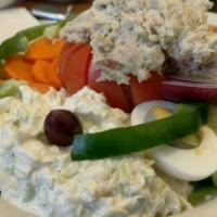 Stuffed Tomato · Stuffed with your choice of tuna or chicken salad. Served with cottage cheese and the chef's...