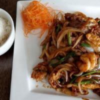 Mongolian Triple · Sliced chicken, shrimp, and beef sauteed with green and white onion in our plum sauce. Hoisi...