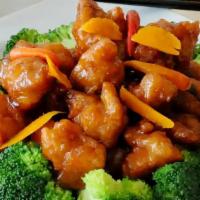 Orange Chicken · Hot, breaded chicken in golden orange sauce flavor and served with steamed broccoli. Hot and...