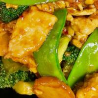 Szechuan Chicken · White meat chicken with Broccoli, carrots, snow peas, green pepper & water chestnuts in spic...
