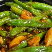 Chicken With String Bean · White meat chicken with green bean in brown sauce.