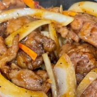 Black Pepper Steak · Flank steak with carrots, onion sautéed with black pepper hot and spicy.