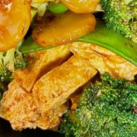 Szechuan Bean Curd · Deep fried bean curd with broccoli, carrots, water chestnuts, snow peas and green peppers in...