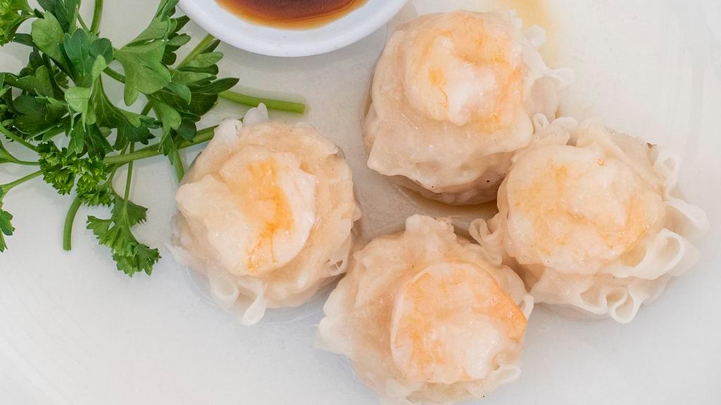 Shumai · Steamed shrimp dumplings with ponzu sauce.