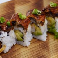 Dragon (8 Pieces) · Shrimp tempura, cucumber, topped with eel, scallions, teriyaki sauce.
