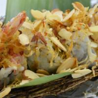 Crunch (8 Pieces) · Shrimp tempura, avocado, cucumber, crab salad topped with almond, potato flakes, teriyaki sa...