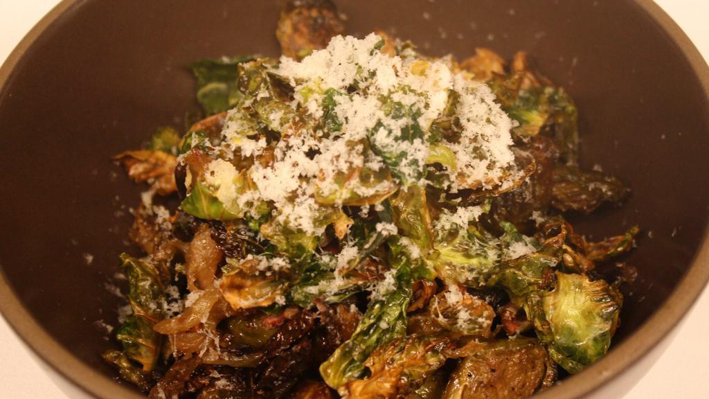 Brussels Sprouts · Caramelized onion, pecans, white cheddar, and sweet mustard dressing.