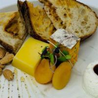 Cheese Plate
 · Rotating selection of artisan cheeses, crostini, fruits, and almonds.