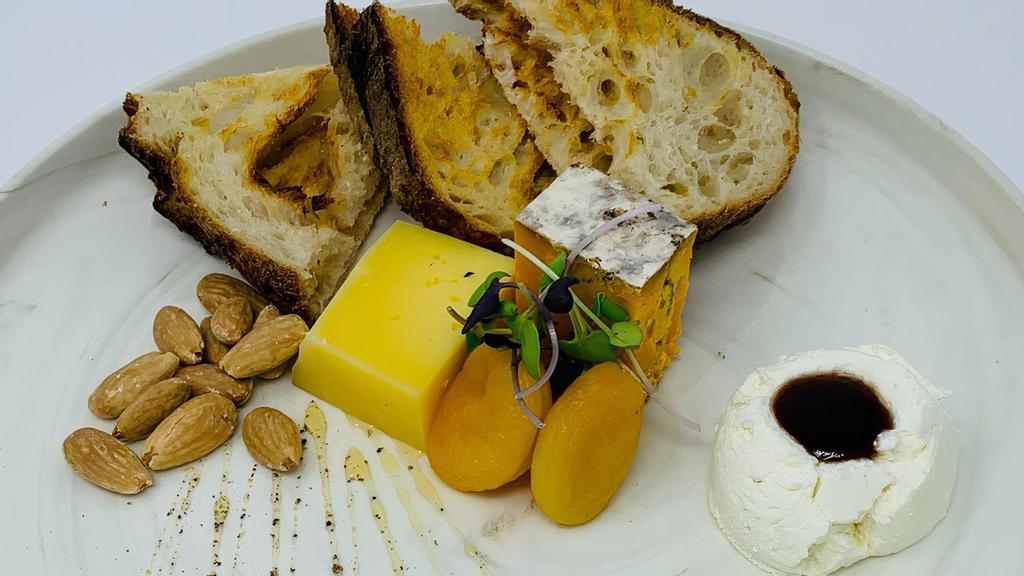 Cheese Plate
 · Rotating selection of artisan cheeses, crostini, fruits, and almonds.
