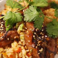 Lamb Chops* · Mongolian marinated and vegetable fried rice.
