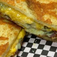 The Bacon Guacamole Melt · Crisp bacon and creamy house-made avocado spread makes this grilled cheese sandwich extra sp...