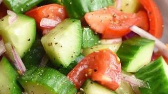 Cucumber  And Tomato Salad · Fresh, sliced cucumbers, diced tomatoes and sliced red onion tossed together in an Italian d...