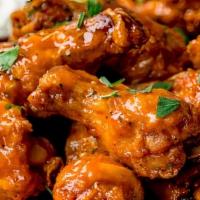 Buffalo Wings · Chicken wings with your choice of sauce. BBQ, hot wing, or mango habanero.