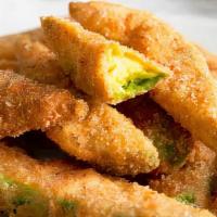 Fried Avocado · Slices of fresh avocado breaded with panko breadcrumbs and flash fried. Served with a chipot...