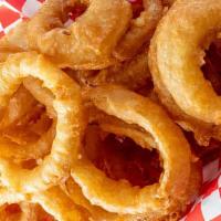 Basket Of Onion Rings · Buttermilk soaked, hand dipped onion rings deep fried to perfection.