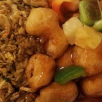 Sweet & Sour Chicken · Breaded chicken breast in a sweet and sour sauce with bell peppers and pineapples.