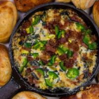 Jalapeno Popper Dip · Applewood Smoked Bacon, Fresh Jalapeno, Artichoke and Spinach Dip, House Cheese Blend, serve...