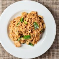 Pad Thai · (Most Famous Dish) Stir-fried small rice noodles mixed with eggs and green onions in a sweet...